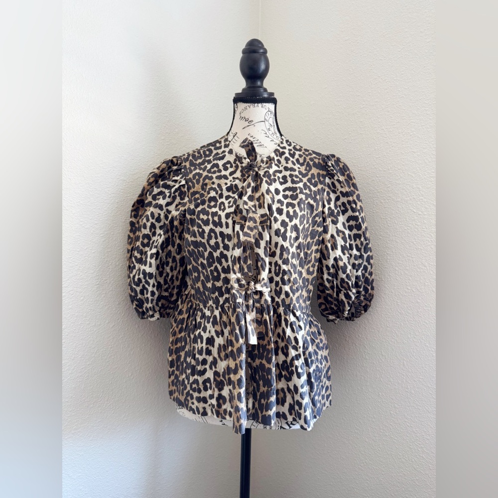 Ganni Animal Print Cotton Poplin Peplum Tie Blouse